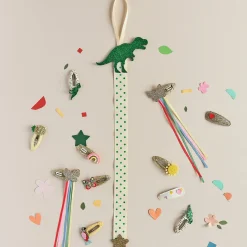 Colgador Clips Pelo · T Rex