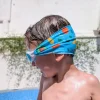 Gafas infantiles azul oscuro con turbante Dinos · Fun Water